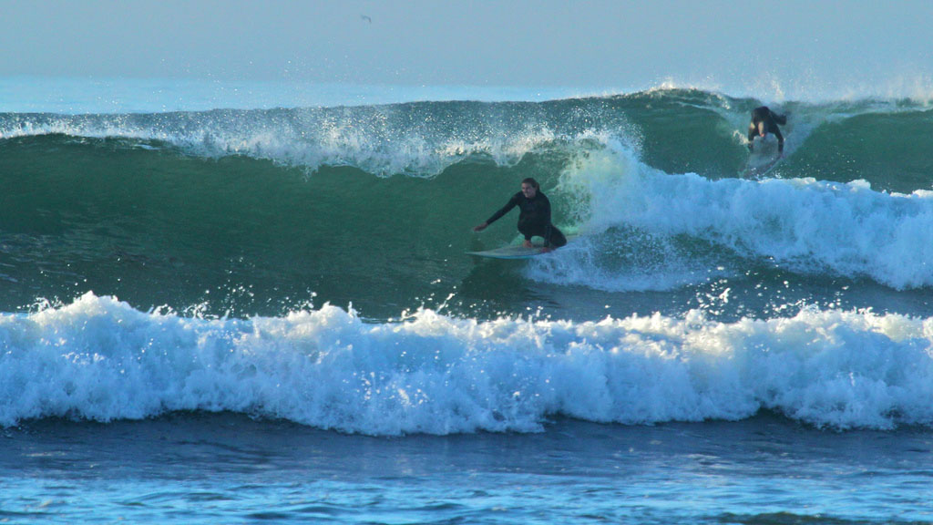 Two surfer riding at Devereux Point